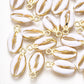 Bedel Kauri schelp Wit goud