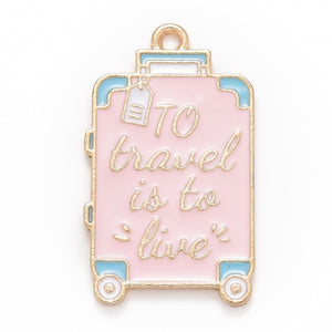 Bedel enamel koffer 'to travel is to live' roze