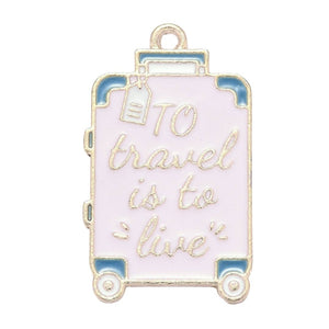 Bedel enamel koffer 'to travel is to live' roze
