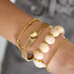 Elastieke kralenarmband met grote ovale kralen Deep Pink RVS goud