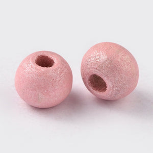 Houten kraal shine pink 6mm